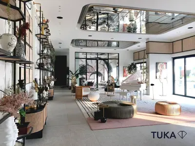 a large room with a lobby with a lot of furniture at Stunning 2-BHK Golfville at Dubai Hills Prime in Dubai