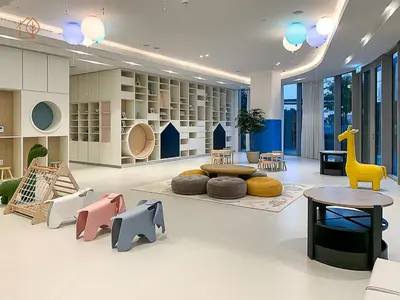 a living room with a giraffe and tables and chairs at Luxury Home with City Views Near Dubai Mall 196GR-1 in Dubai