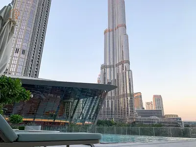 a view of a city skyline with a skyscraper at Luxury Home with City Views Near Dubai Mall 196GR-1 in Dubai