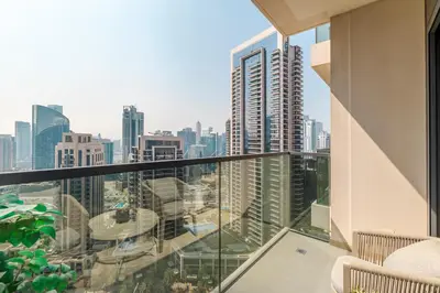 an apartment balcony with a view of the city at 1BR Act One Act Two T2 City View Downtown in Dubai