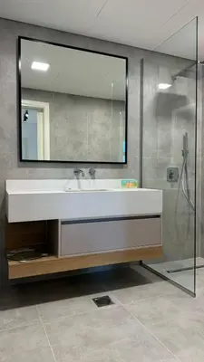 a bathroom with a sink and a large mirror at DAYF-LFT 2 BR in the heart of Downtown walking distance to Burj Khalifa Park in Dubai
