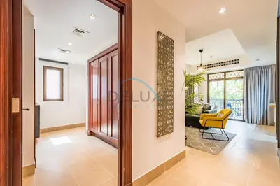a view of the living room from the hallway at Appealing 1BR Apartment at Miska 2 Old Town, Downtown Dubai by Deluxe Holiday Homes in Dubai
