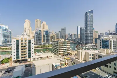 a view of a city skyline with tall buildings at Beautiful Stylish Apartment with Marina Views in Dubai