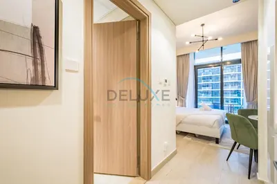 a room with a door leading to a bedroom at Lovely Studio Apartment at Azizi Riviera 46 in Al Merkadh by Deluxe Holiday Homes in Dubai