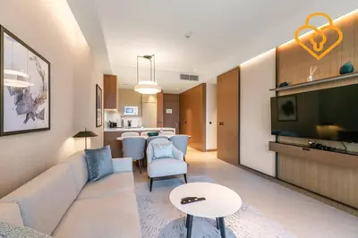 a living room with a couch and a table at Keysplease Address Opera 2BR Downtown 26 in Dubai