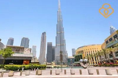 a view of a city with a skyscraper at Keysplease Address Opera 2BR Downtown 26 in Dubai