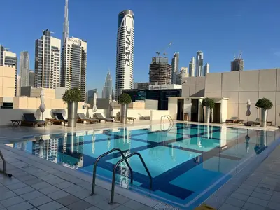 a large swimming pool on top of a building at Knokey Bay Square in Dubai