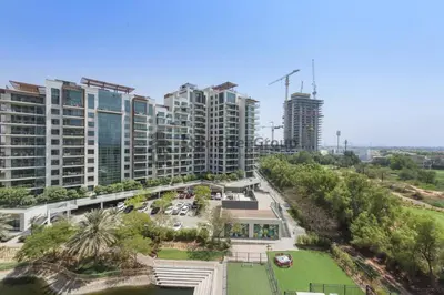 an aerial view of a city with tall buildings at Stylish 1 Br In Unique Location in Dubai