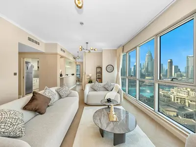a living room with a view of the city at Burj Khalifa & Fountain Show Views 4 BHK In Downtown, 2 minutes walk to Dubai Mall in Dubai