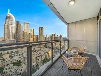 a balcony with a view of a city skyline at Burj Khalifa & Fountain Show Views 4 BHK In Downtown, 2 minutes walk to Dubai Mall in Dubai