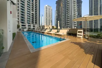 a swimming pool on the roof of a building at Magnificent 2BR Apartment at Act One Act Two Tower 2 in Downtown Dubai by Deluxe Holiday Homes in Dubai