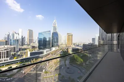 a view of a city from a glass floor in a building at Stunning Address Opera 3Bedroom in Dubai