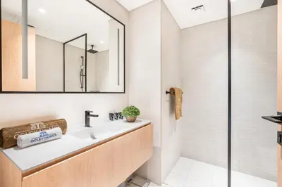 a bathroom with a sink and a shower at Stunning Home Overlooking the Burj Khalifa in Dubai