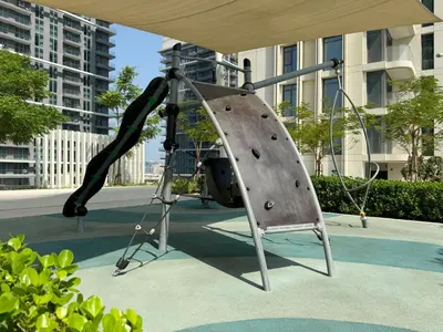 an outdoor rock climbing exhibit in a city at Atlantis View 1BR with Beachfront Access and Balcony in Dubai
