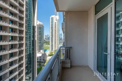 a balcony with a view of the city at One Bed with Burj Khalifa View in Dubai
