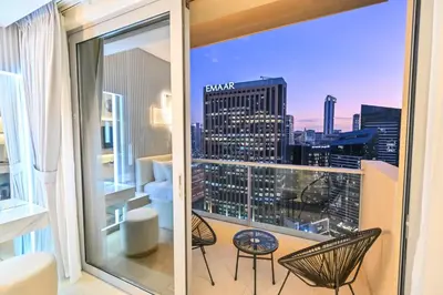 a balcony with a view of a city skyline at Upgraded Luxury Studio Apartment - Marina View - 5-Star Hotel Amenities in Dubai