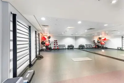 a bowling alley with red balloons on the wall at Burj Khalifa & Fountain View- 5mn walk to Dubai mall -Luxurious & Stylish 1BDR Apartment in Dubai