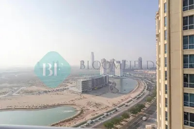 a view of a city with a beach and buildings at Bloomfields Stu Lago With Vista Sea View in Dubai