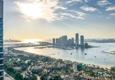 an aerial view of a city with a harbor at Livbnb - 1B Palm Jumeirah and Sea View at Avani in Dubai