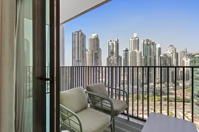 a balcony with a view of a city skyline at Stunning 1 bedroom Apartment w Burj Khalifa View in Dubai