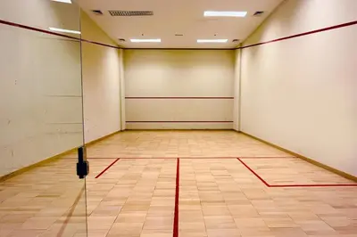 an empty gymnasium room with a basketball court at Livbnb-Spacious JVC Studio, Near Dining and Shops in Dubai