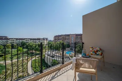 a balcony with a view of a building at Frank Porter - Widcombe House 3 in Dubai