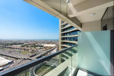 a view from the balcony of a high rise building at Modern 2-Bedroom Apartment in Aykon Tower C in Dubai