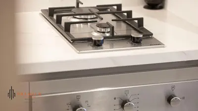 a stove top oven sitting on top of a counter at PREMIER STUDIO I Poolside in Dubai