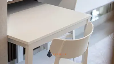a white desk with a white chair in a room at PREMIER STUDIO I Poolside in Dubai