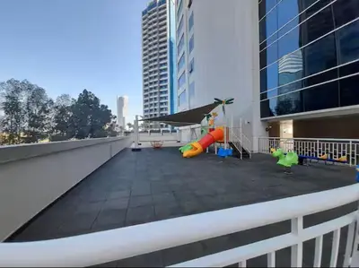 a playground on the roof of a building at Vogue Al Fahad Tower, Al Barsha Heights near Mall of The Emirates, Walking Distance to DIC Metro Station, Two Bedroom Apartment with Balcony and Access to all Amenities in Dubai