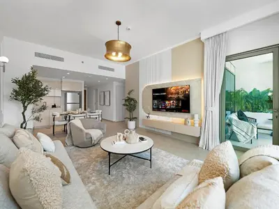 a living room with a couch and a table at Apartment in Downtown Dubai in Dubai