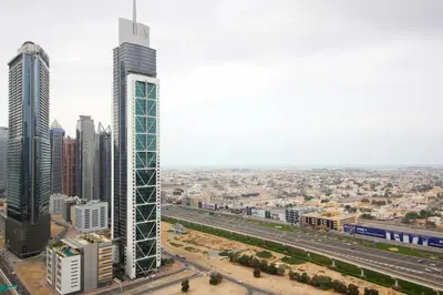 an aerial view of a city with tall buildings at Downtown Luxury - Stunning 2BHK with Sea view in Forte towers, Downtown in Dubai
