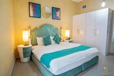 a bedroom with a large bed and two lamps at Luxury apartment in Dubai marina 5 min walk to JBR Beach-3BHK Apartment in Dubai
