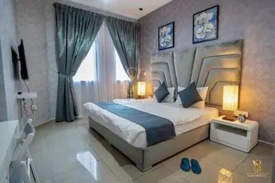 a bedroom with a large bed and a large window at Luxury apartment in Dubai marina 5 min walk to JBR Beach-3BHK Apartment in Dubai