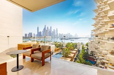 a living room with a view of the city at FIVE Palm Residence - Elegant Home in Dubai