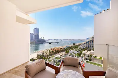 a view of the ocean from the balcony of a building at FIVE Palm Residence - Elegant Home in Dubai