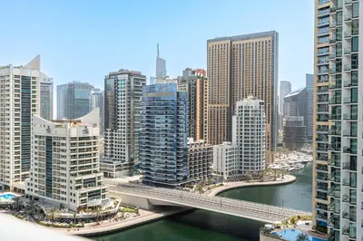 a view of a city with a bridge and buildings at Gorgeous 2BR APT in Dubai Marina with Canal View in Dubai