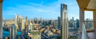 an aerial view of a city with tall buildings at New Downtown Setup - Penthouse with Panoramaic Views in Dubai