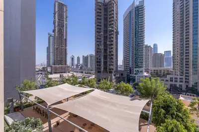 a view of a city skyline with tall buildings at Stylish Urban Living - 1-bedroom in Burj Royale in Dubai