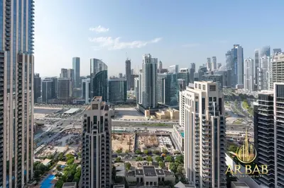 an aerial view of a city with tall buildings at 29 Burj Boulevard - Premium 1BR - City Skyline view - Near Burj Khalifa - Downtown Dubai in Dubai