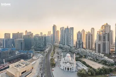 an aerial view of a city with tall buildings at bnbme - Chic Downtown Studio Near Burj Khalifa Dubai Mall w Pool Gym Concierge in Dubai