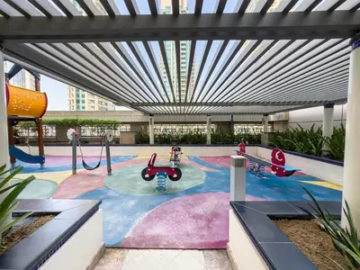 a playground in a building with a large ceiling at The Skyline Suite Luxury Downtown Retreat in Dubai