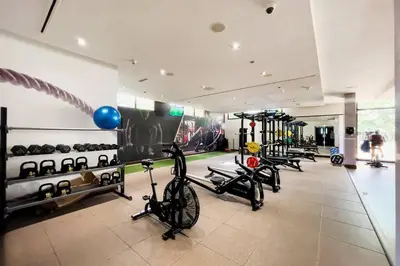 a gym with a bunch of bikes in a room at Palm Jumeirah Studio Sea View Royal Amwaj in Dubai
