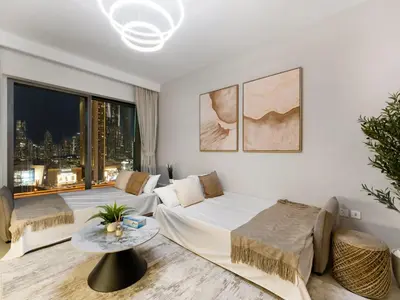 a bedroom with two beds and a large window at Premium Two-Bedroom Apartment with Private Balcony & Full Burj Khalifa Views by Al Fannan Holiday Homes in Dubai