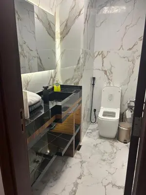 a bathroom with a sink and a toilet in it at Stunning SeaView Elite Residence Dubai Marina in Dubai
