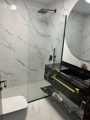 a bathroom with a toilet and a mirror at Stunning SeaView Elite Residence Dubai Marina in Dubai