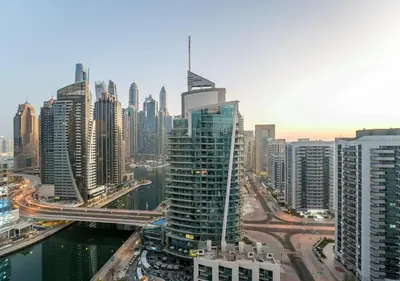 a view of a large city with many tall buildings at Perfect Stay - 1Bedroom with full Marina View in Dubai