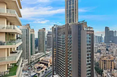an aerial view of a city with tall buildings at Skyline Views 2BR Near Burj Khalifa & Dubai Mall with Pool Access in Dubai