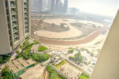 an aerial view of a city with tall buildings at Business bay Chic Apartment in Dubai