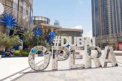 a sign that reads durian park in front of buildings at Stylish Downtown Retreat, Burj Crown, Opera & Boulevard View in Dubai
